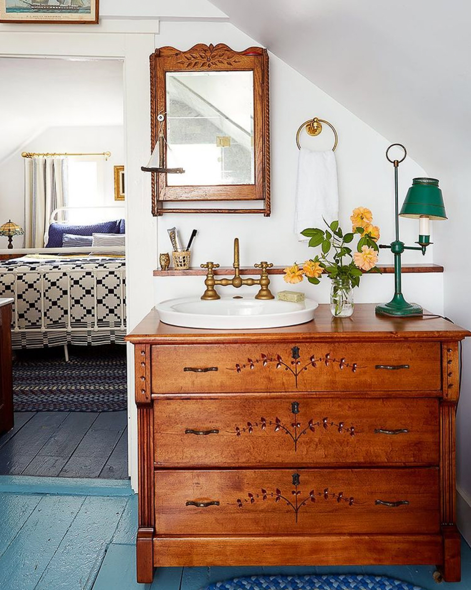 Antique dresser turned bathroom vanity 