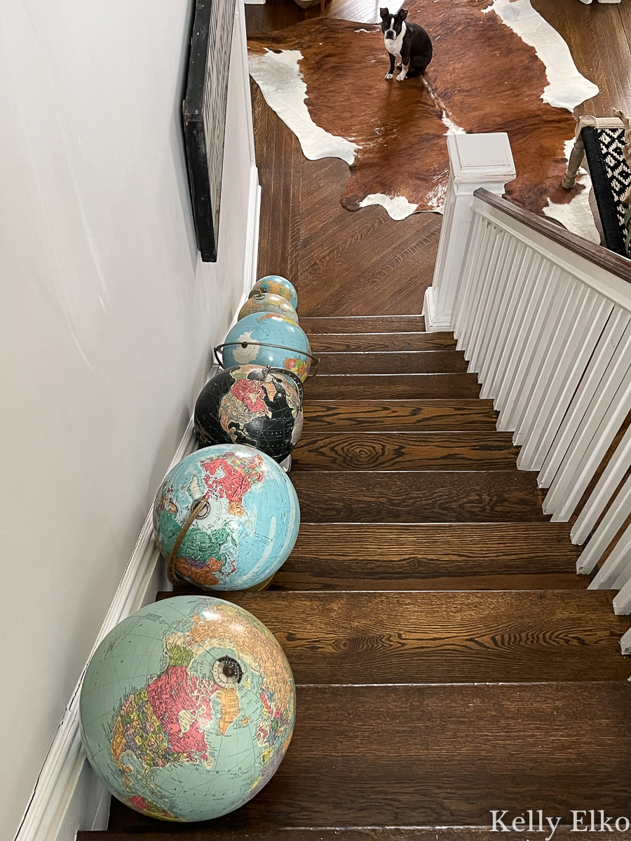 Love these vintage globes on the stairs kellyelko.com 