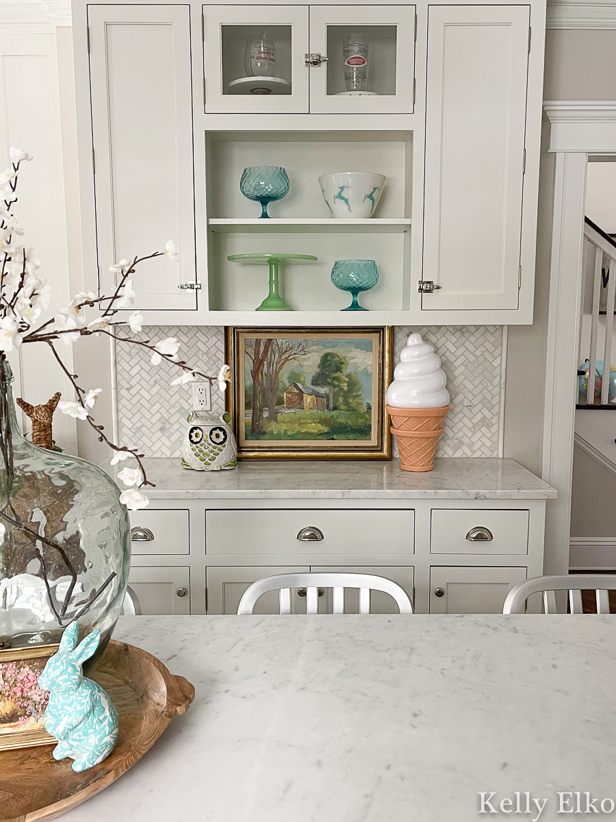 Farmhouse white kitchen cabinets - love the open shelves for displaying all these fun vintage finds and painting kellyelko.com