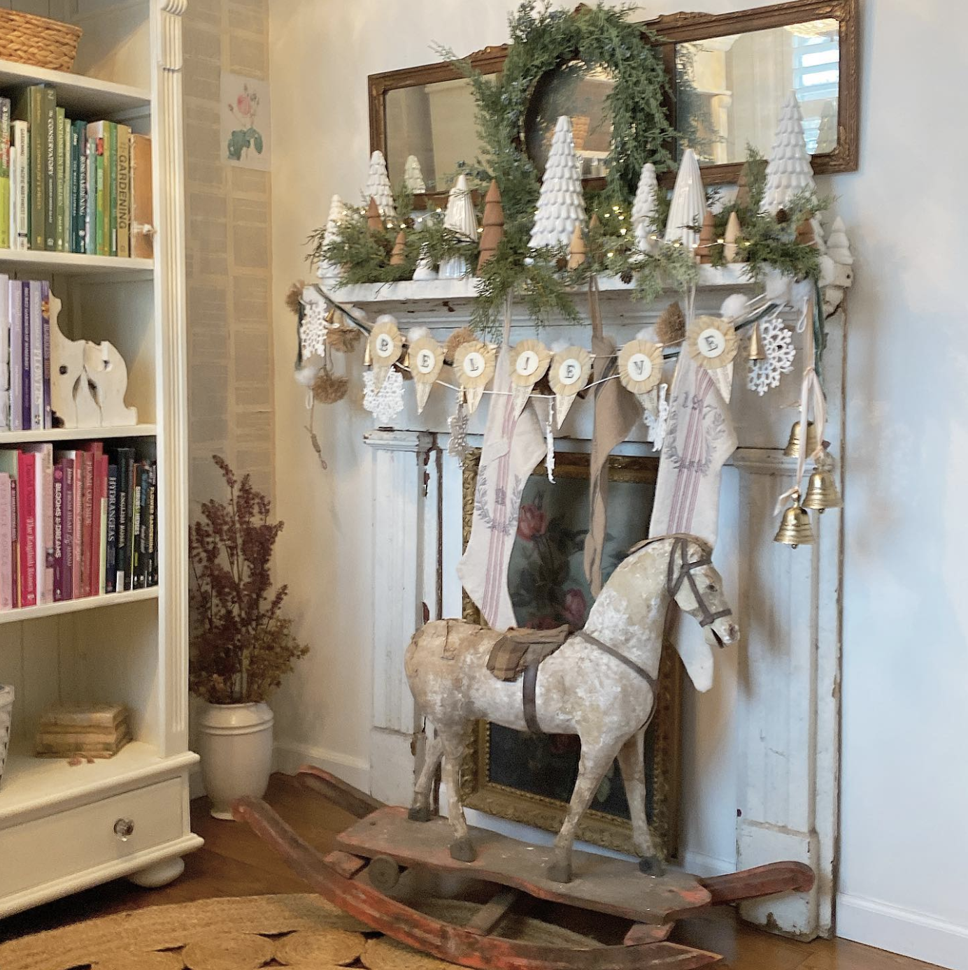 Antique rocking horse Christmas mantel - love the ceramic and wood trees mixed together