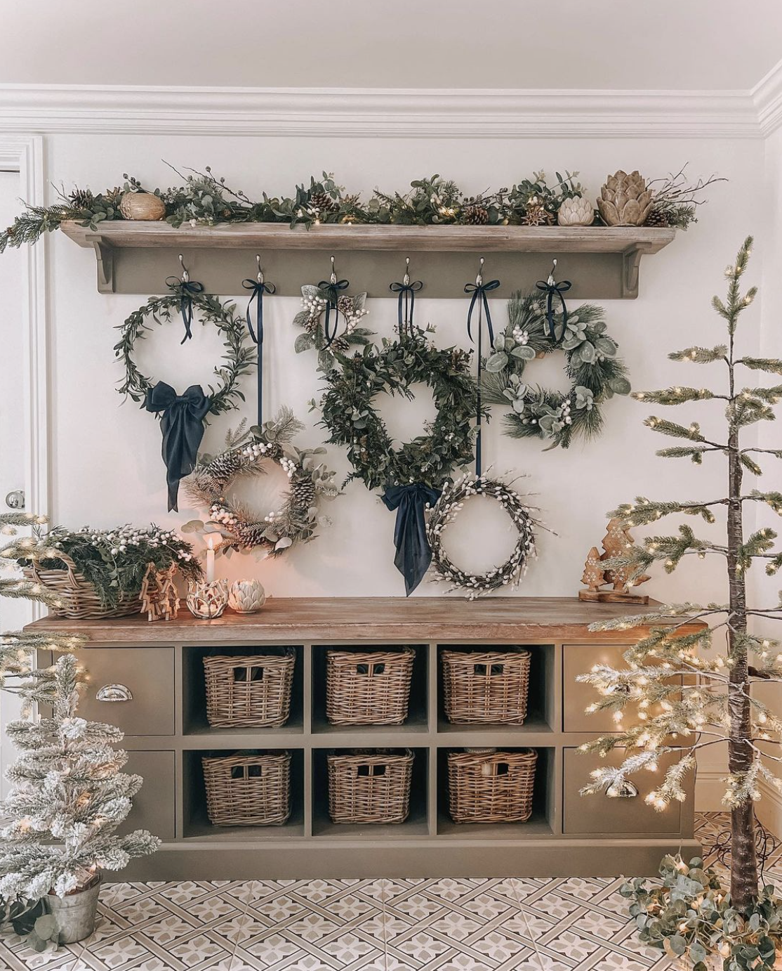 Fun idea to hang different kinds of Christmas wreaths together