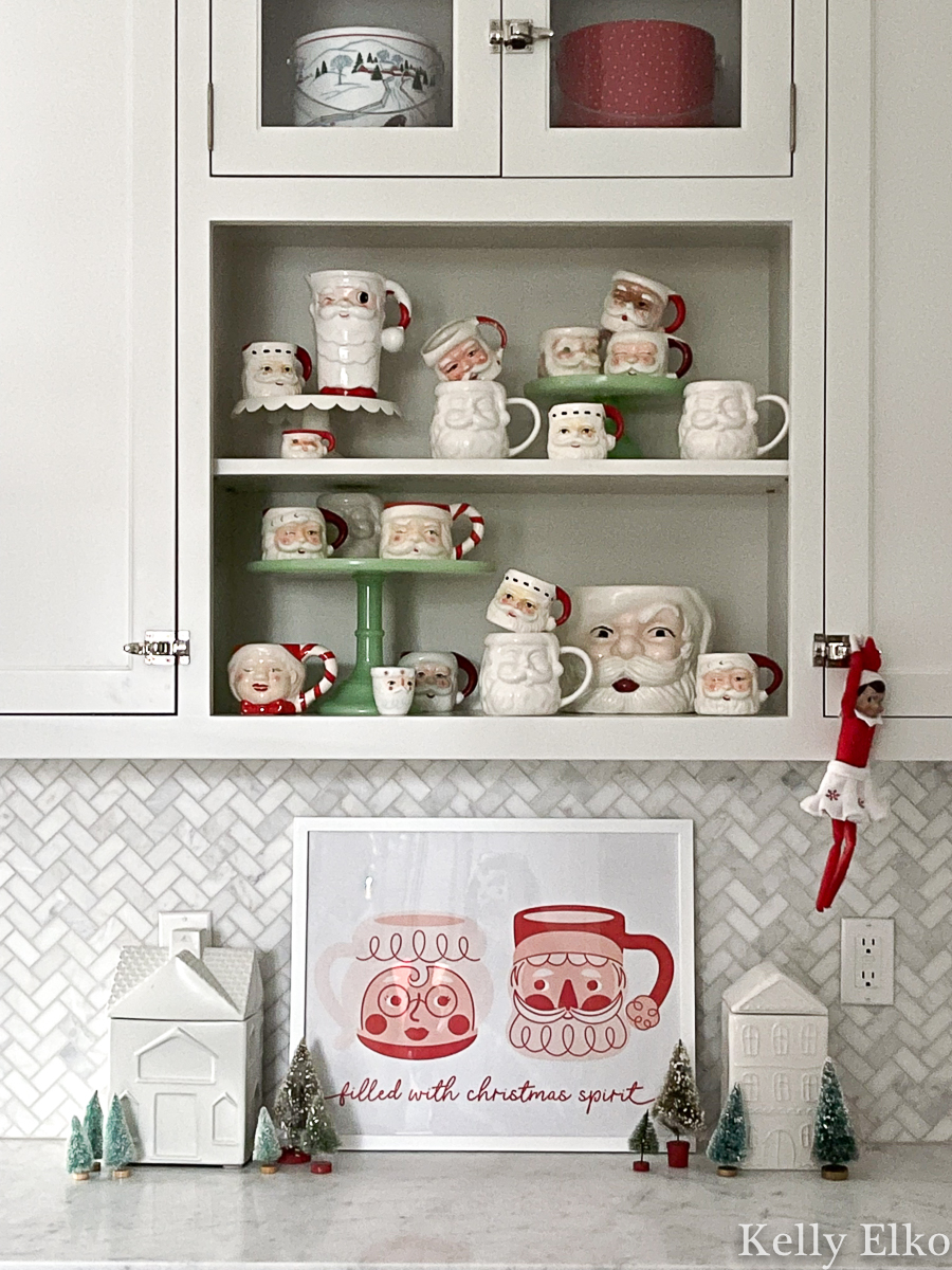 Gift Bag Framed Art - love this Santa and Mrs Claus mug art in this kitchen and the vintage Santa mug collection / kellyelko.com