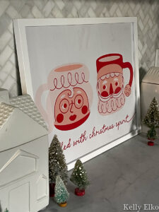DIY Gift Bag Framed Art - love this fun Santa and Mrs Claus mug art kellyelko.com