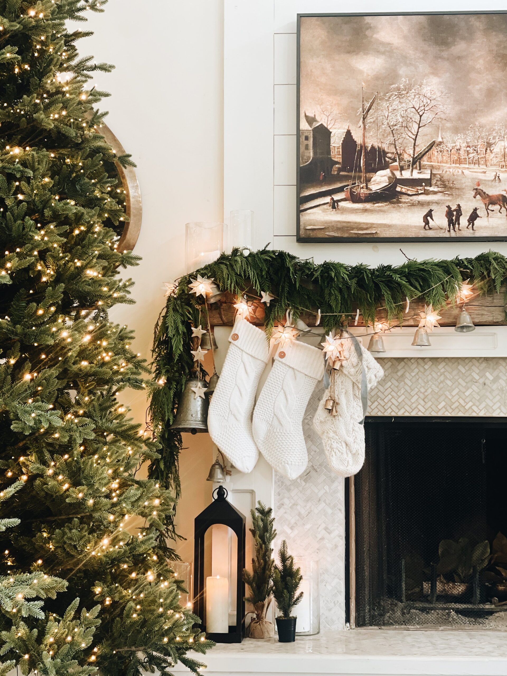 Beautiful mantel with star lights and silver bells 