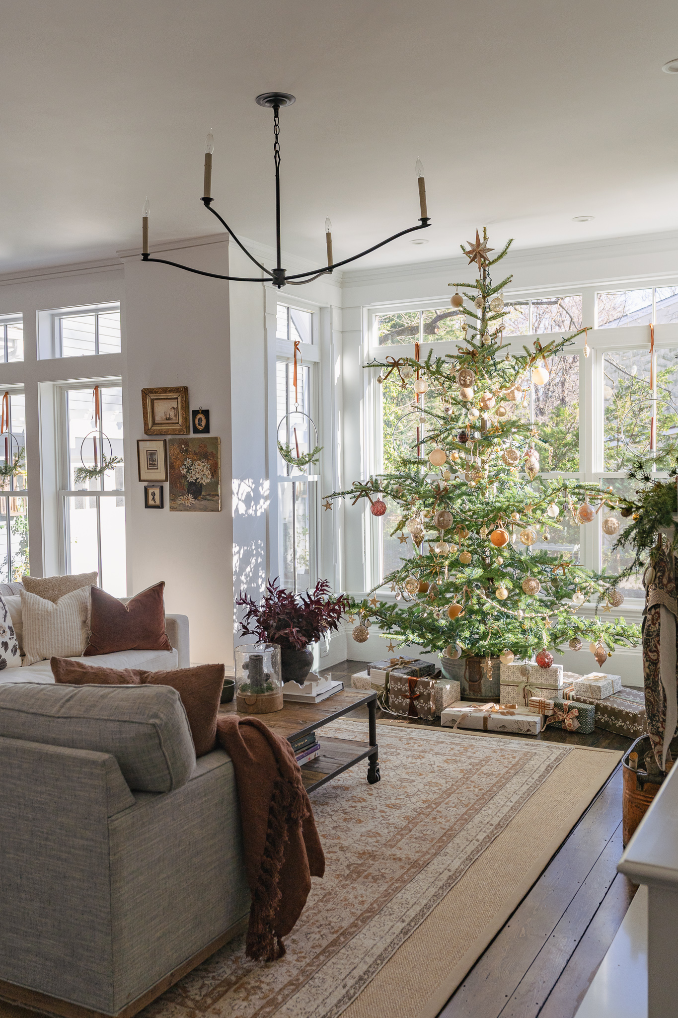Stunning real Christmas tree covered in vintage ornaments 
