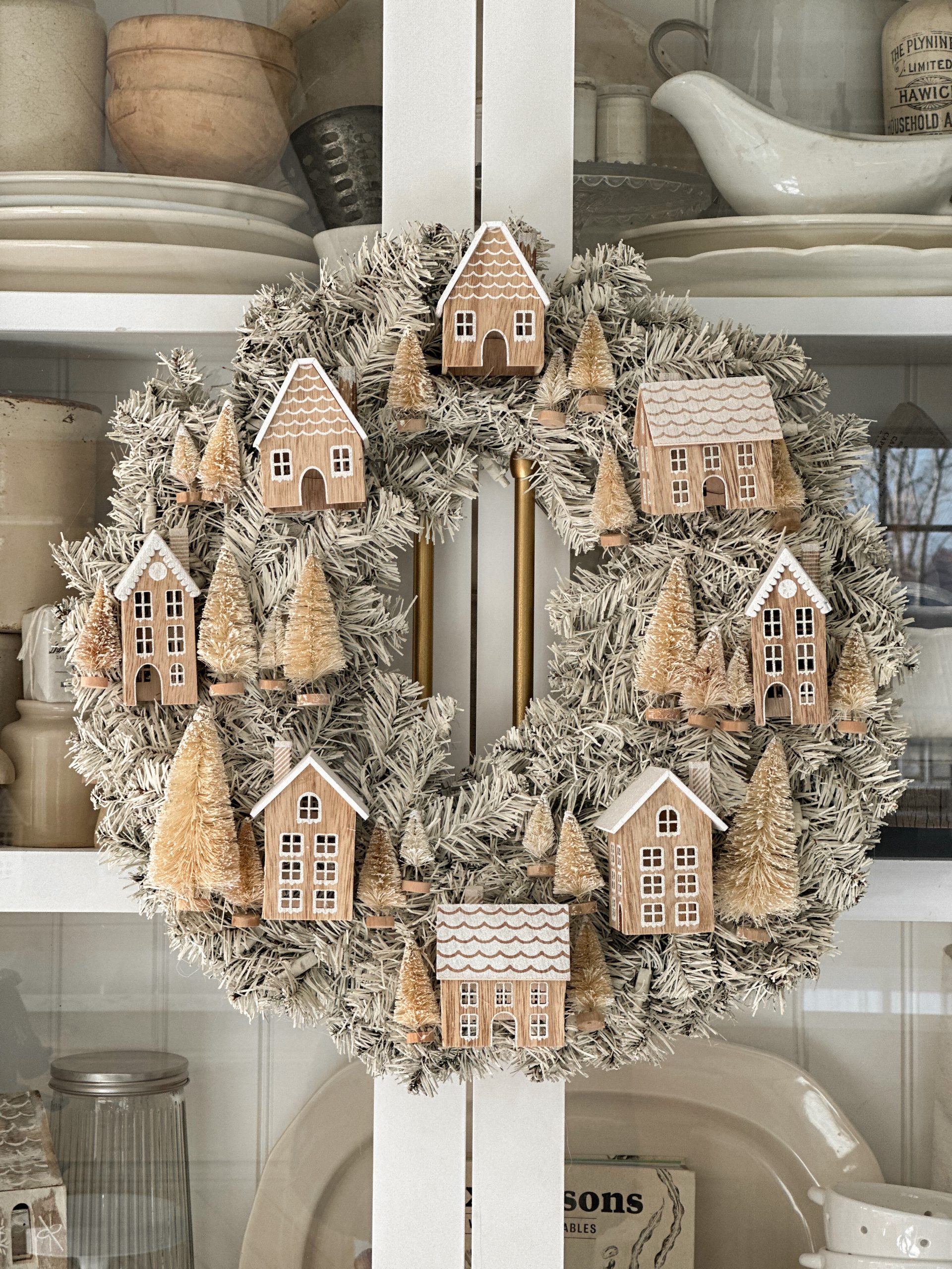 Creative Christmas Wreaths - love this DIY Christmas Village Wreath / kellyelko.com