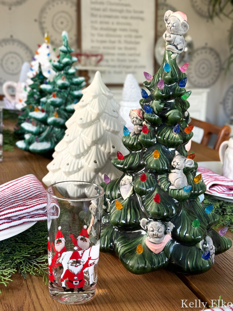 Vintage Ceramic Christmas Trees - love this festive table with trees, Santa mugs and bottle brush trees kellyelko.com