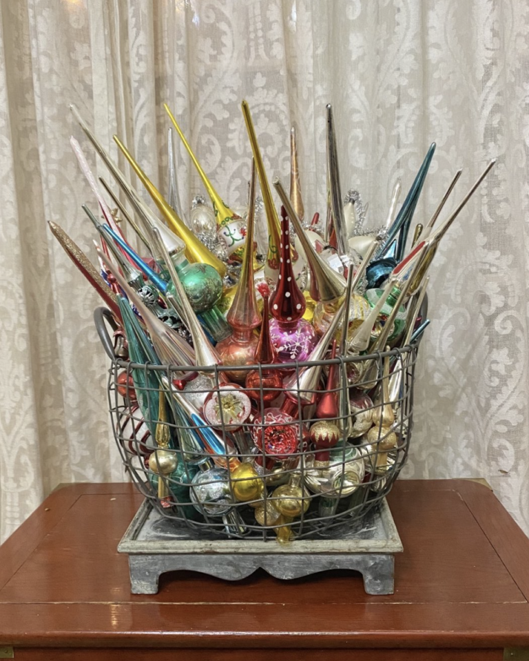 Vintage Christmas Tree Toppers - such creative display ideas like these in an old wire basket / kellyelko.com