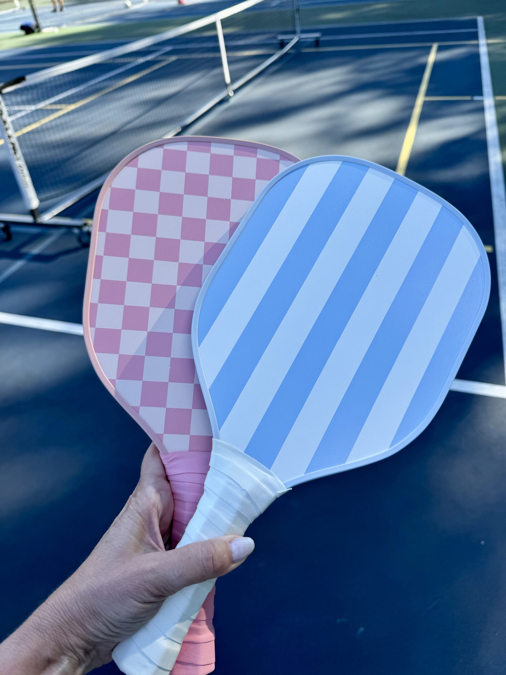 Pink and blue pickleball paddles / kellyelko.com