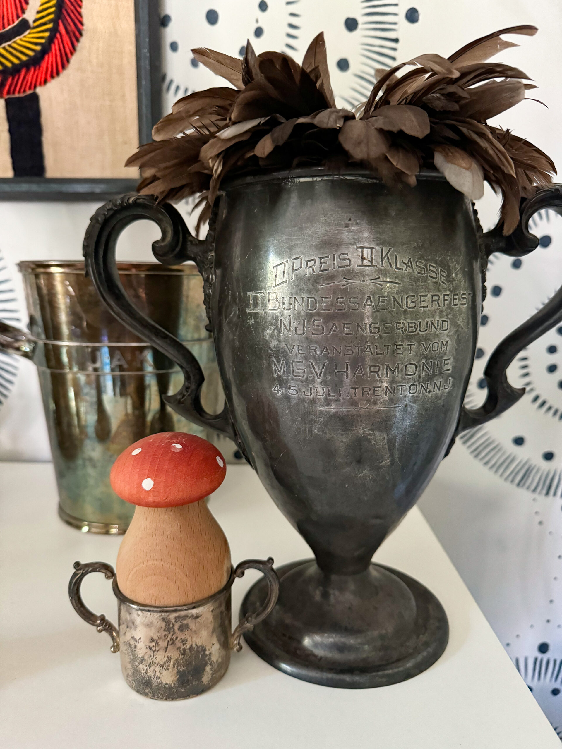 Vintage engraved silver loving cup with feathers / kellyelko.com