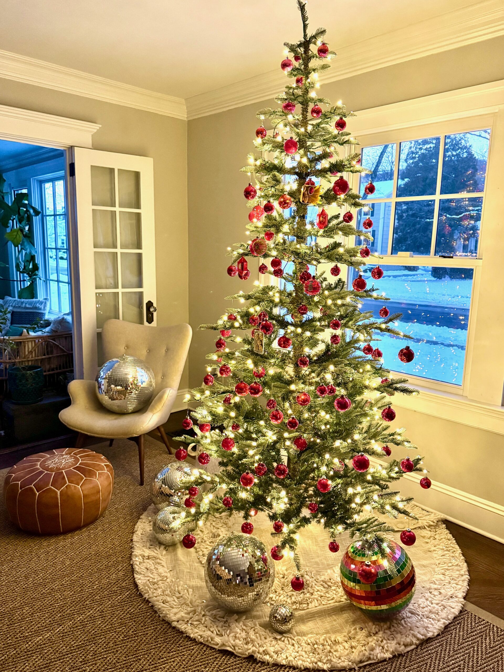 Sparse Christmas tree with vintage red ornaments